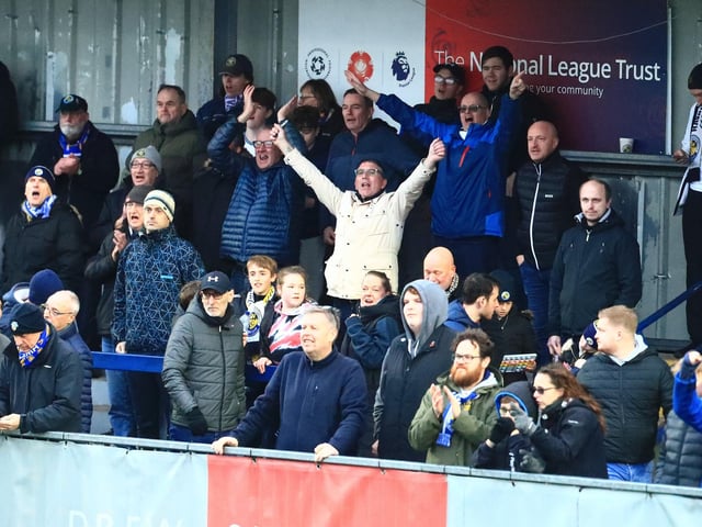 Hawks fans celebrate their side's late winner. Picture by Dave Haines