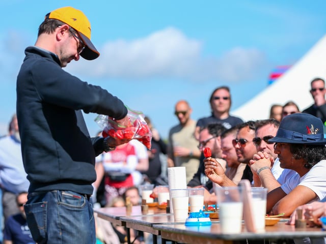 Bringing out the big guns! Scotch Bonnets are handed out to the chilli eating contestants.