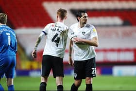 Charlie Daniels celebrates with Tom Naylor following last night's 3-1 win at Charlton. Picture: Joe Pepler