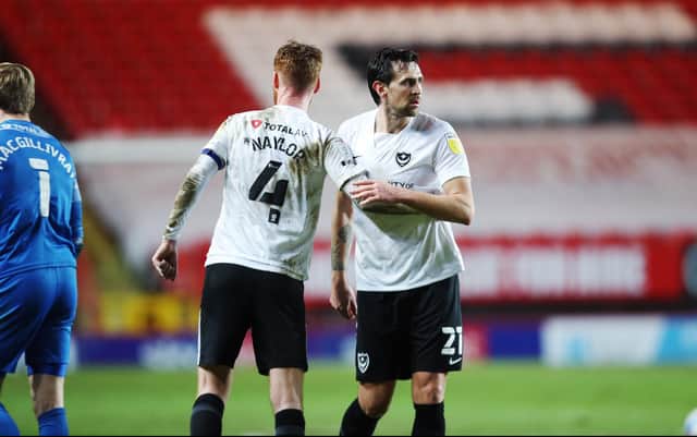 Charlie Daniels celebrates with Tom Naylor following last night's 3-1 win at Charlton. Picture: Joe Pepler