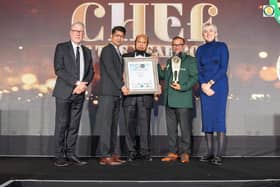 MG Farooque collecting his award