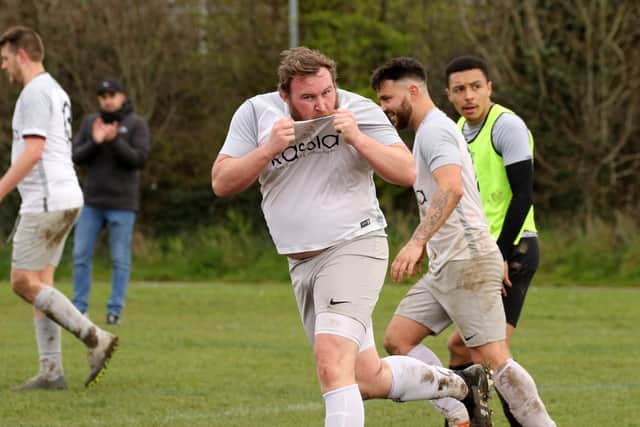 A Watersedge player kisses the badge after putting his side 3-2 up against Bedhampton Village Reserves. Picture Kevin Shipp