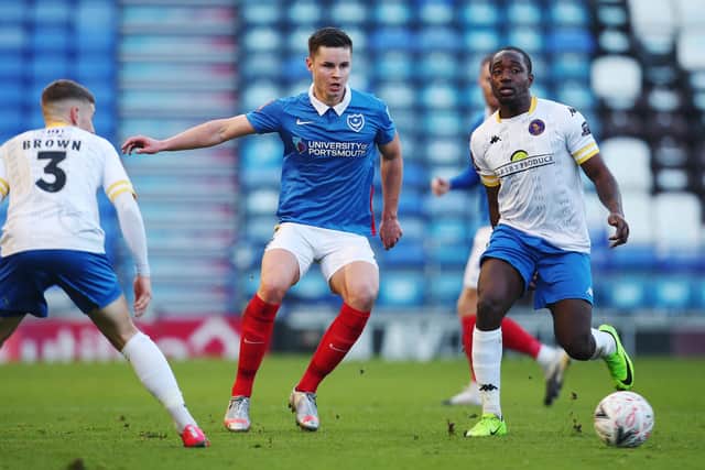 King's Lynn (white) in FA Cup second round action against Portsmouth last November. The Linnets are now threatening not to fulfil all their remaining 2020/21 National League fixtures after being told they would not be getting any more grant money from the Government. Pic: PinPep Media / Joe Pepler.