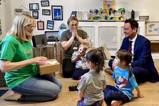Stephen Morgan MP with youngsters and their carers at a nursery