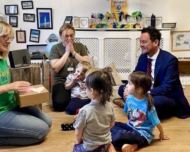 Stephen Morgan MP with youngsters and their carers at a nursery