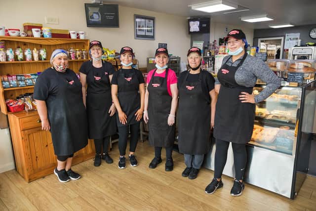 Staff at the Whistlestop Café next to Cosham train station. Pictured: The two Jackies,  Sue's 20 year old daughter Beth and owner Sue Hills in pink t-shirt, Tina and Jasmine. Picture: Mike Cooter (150721)