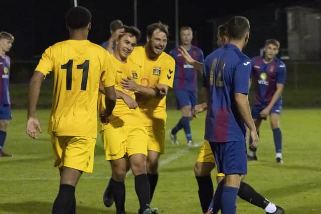 Jack Breed is congratulated after  his goal for Fareham at US Portsmouth. Picture by Ken Walker.