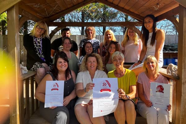 Hopscotch Day Nursery receives it's award as one of the top 20 nurseries in the South East.
