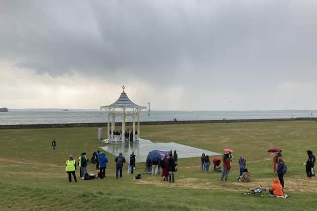 Protestors arrive at Southsea Bandstand where salsa dancers were performing 