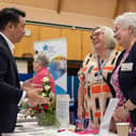 Alan Mak MP chats with Liza Bailey and Valerie Wallington from Hayling Flower Club