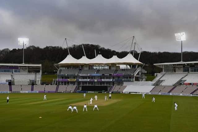 Cricket in March in England - The Ageas Bowl lights are on in the evening session as Northants bat against Hampshire. Photo by Mike Hewitt/Getty Images.