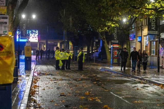 Police incident outside Tokyo Joe's in Guildhall Walk, Portsmouth, on Saturday night. Four men were stabbed or slashed and were hospitalised.