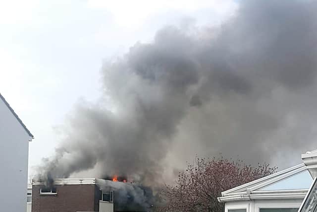 Smoke and flames billow out from the upstairs flat at The Redan in Gosport.
Picture: JCP