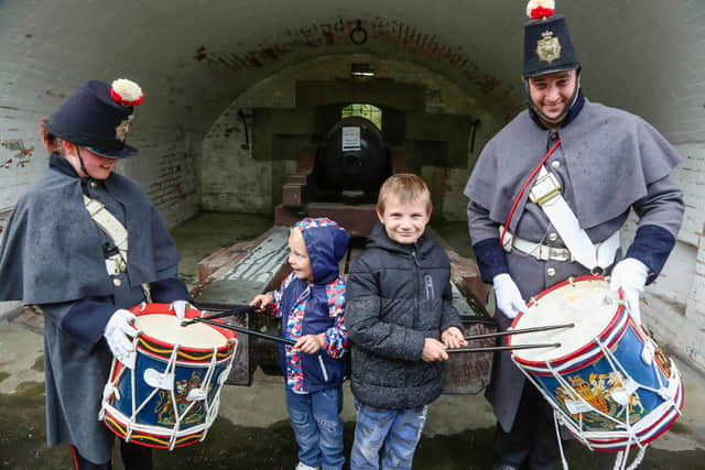 Kason (5) and Marc Jr Lovlock (8) on the drums of Tamsin Coster and Scott Taylor of The Fort Cumberland Guard.