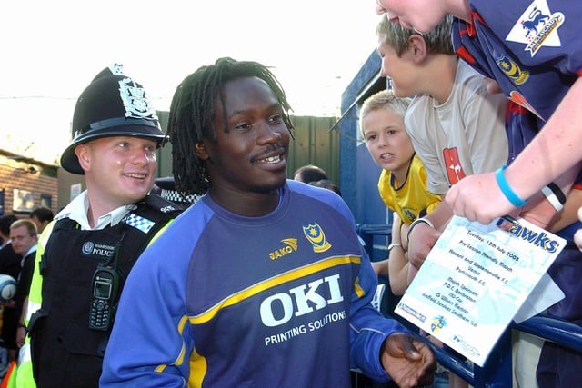 Linvoy Primus signs autographs for fans ahead of Pompey's friendly against Havant & Waterlooville at West Leigh Park in 2005.