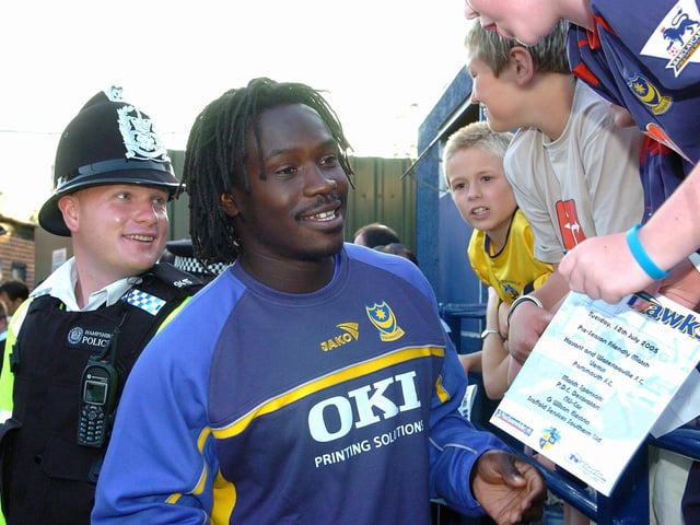 Linvoy Primus signs autographs for fans ahead of Pompey's friendly against Havant & Waterlooville at West Leigh Park in 2005.