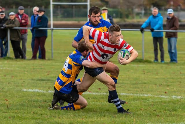 Havant's Harry Rabjohn trying to find a way through Gosport & Fareham's defence. Picture: Mike Cooter