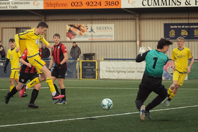 Action from the U16 GEC Marconi Invitation Cup final between Horndean Hawks Condors (red/black) and Pickwick Youth Panthers (yellow). Picture: Keith Woodland (260221-1024)