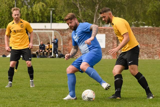 Shane Cornish, middle, netted on his Moneyfields debut as they beat Chamberlayne 3-1 at Petersfield School.
Picture: Keith Woodland