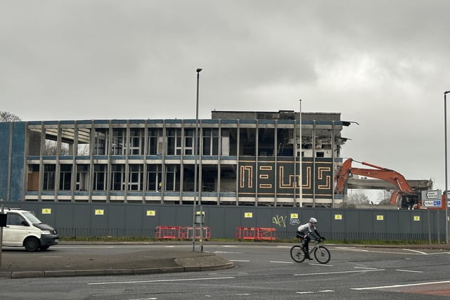 The moment just before the 'News' mosaic was demolished