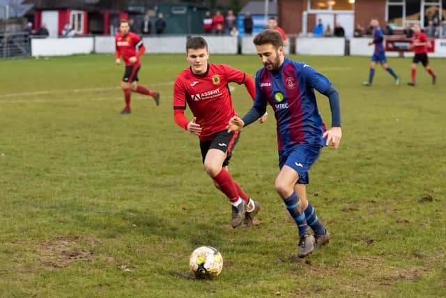 Dec Seiden, right, in action for a US Portsmouth side who were seven points clear at the top of the Wessex League Division 1 table when the 2019/20 season was halted.  Picture: Duncan Shepherd