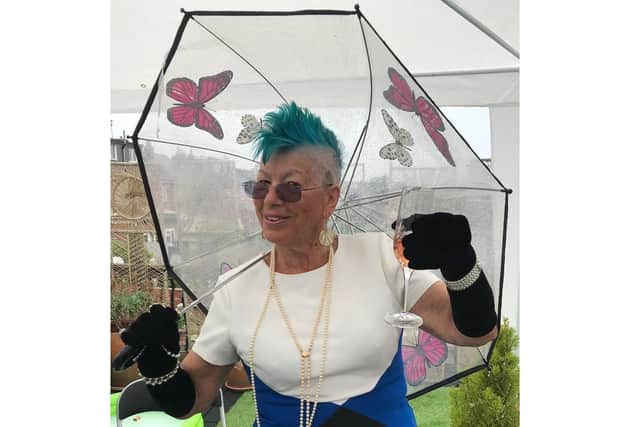 Jill looking the part with a glass of champagne