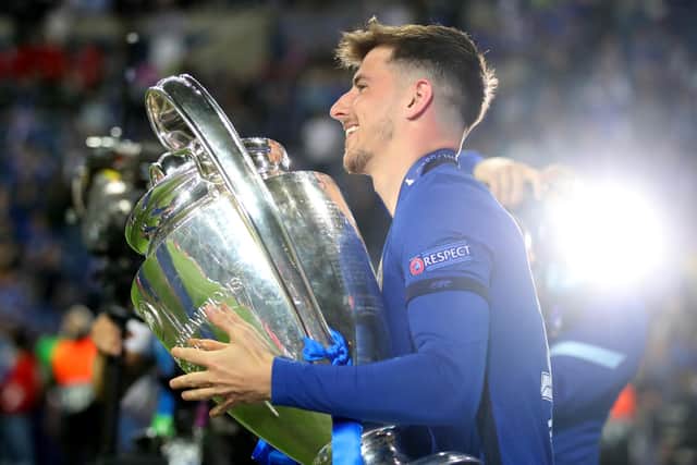 Mason Mount celebrates with the Champions League Trophy. Picture: Carl Recine - Pool/Getty Images)