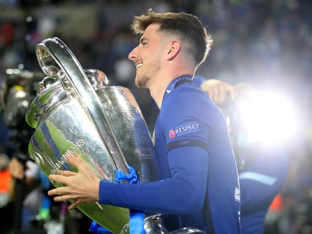 Mason Mount celebrates with the Champions League Trophy. Picture: Carl Recine - Pool/Getty Images)