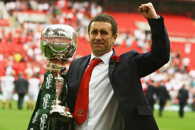 Liam Daish celebrates with the FA Trophy after Ebbsfleet's 2008 final win against Torquay. Photo by Ian Walton/Getty Images.