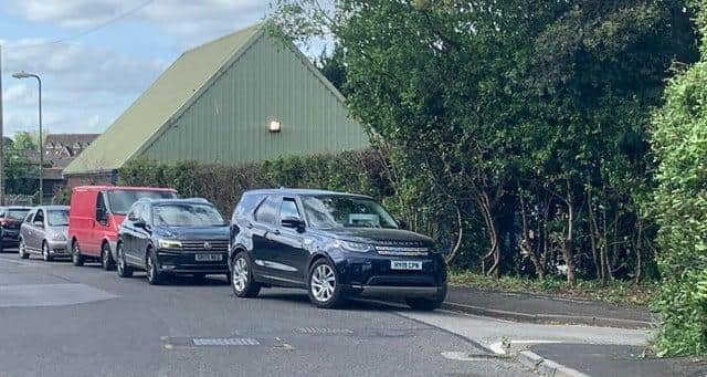 Cars queue to get into the Bishop's Waltham Household Waste Recycling Centre when it reopened on May 11 Picture: Sarah Standing Copyright: JPIMedia