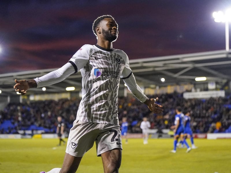 Abu Kamara turns to the Pompey fans after scoring his second goal of the game against Shrewsbury