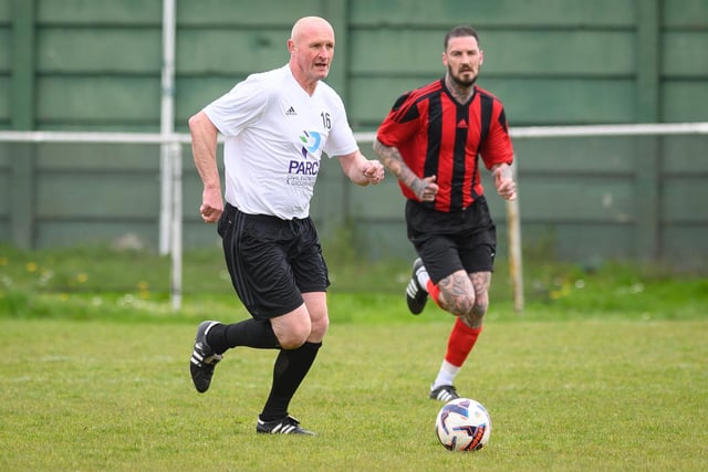 Action from the Jon Gittens memorial charity match between a team of former Fareham Town players and a side of ex-Pompey and Southampton professionals. Picture: Keith Woodland (160421-188)