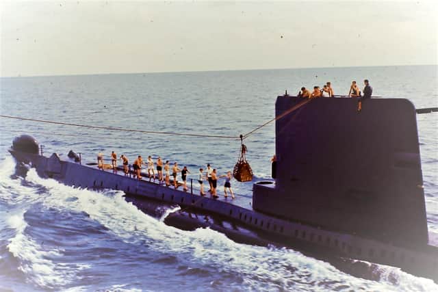 Victuals being transferred from RFA Fort Duquesne to HMS Ambush 1964.