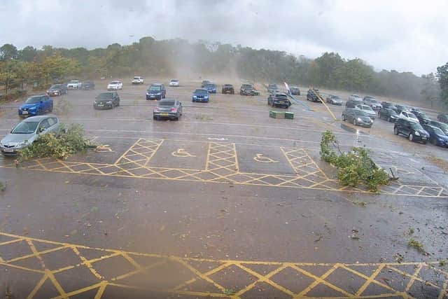 CCTV image issued by Marwell Zoo of a tornado causing damage to Marwell Zoo car park in Hampshire. Issue date: Monday October 24, 2022.