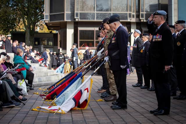 Parades across the UK have been called off this Remembrance as the country continues to battle coronavirus. Pictured: Standards being lowered in Portsmouth last year. Photo: Habibur Rahman