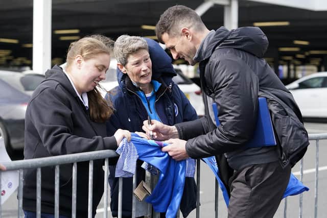 John Mousinho with Pompey fans before the encounter with Port Vale. Now he's eyeing sunshine and the continent for Blues followers in the form of a pre-season tour. Picture: Jason Brown/ProSportsImages