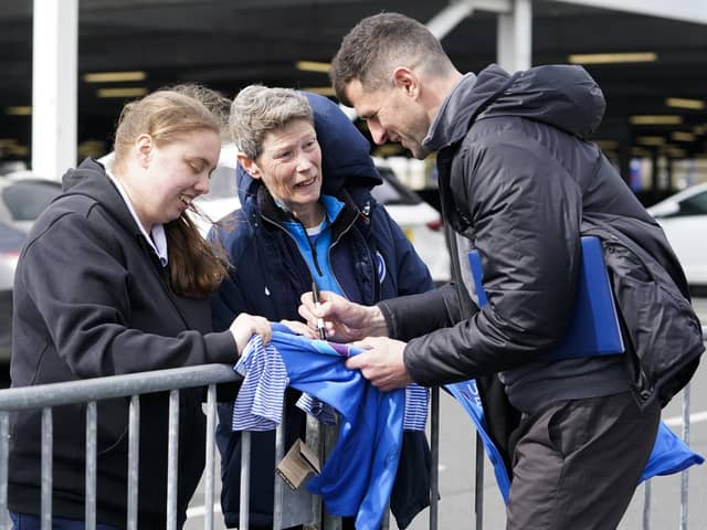 John Mousinho with Pompey fans before the encounter with Port Vale. Now he's eyeing sunshine and the continent for Blues followers in the form of a pre-season tour. Picture: Jason Brown/ProSportsImages