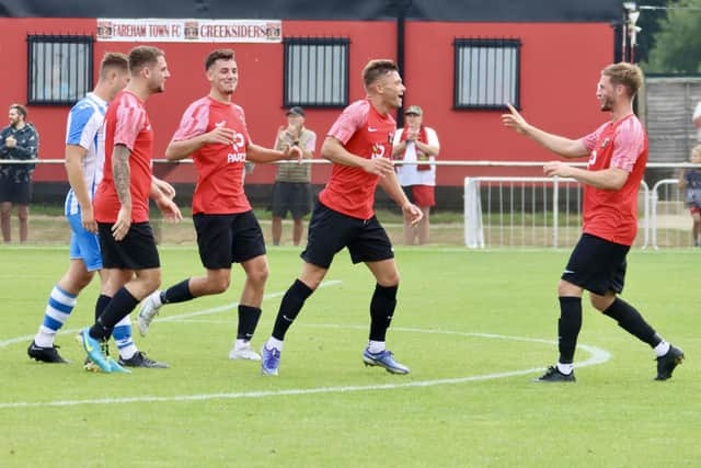 Josh Benfield has just netted one of his two first-half goals for Fareham against Cowes. Picture by Ken Walker