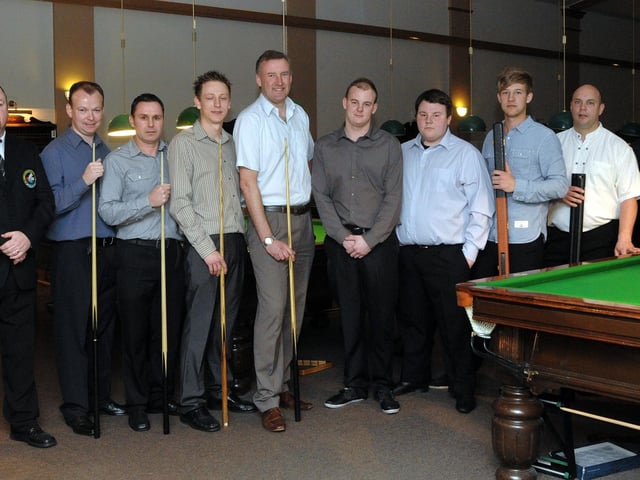 The participants in the 2011 handicapped pairs finals at Craneswater Club. Left to right: referee Steve Toms, Matt Paffett, Jon Sproates, Greg Harding, Chris Handyman, Frankie Stanley, James Green, Matt James, Matt Hannamm and referree Dennis Hushley.