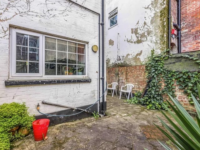 This property comes with three double bedrooms, two bathrooms and two reception rooms.