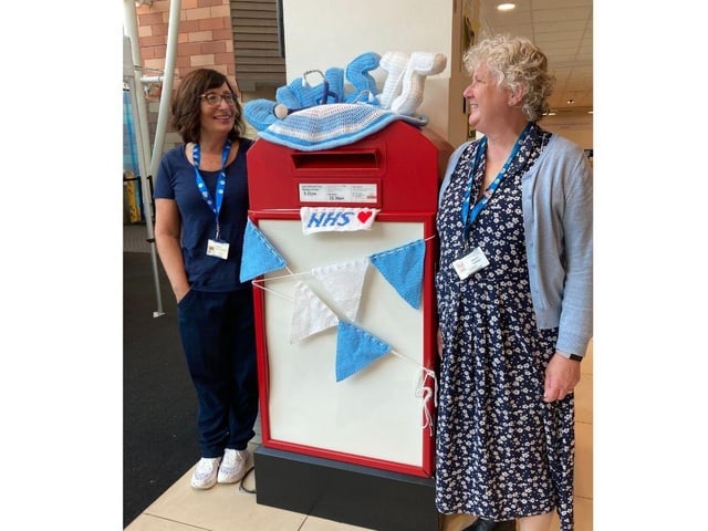 The NHS have celebrated turning 75 by collaborating with a local knitting group who have created installations that have been distrubuted across Portsmouth.
Pictured: NHS staff with one of the many decorative pieces of knitted art.