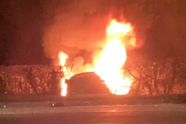 A car caught fire after a two-vehicle collision on Portsdown Hill on Saturday night. A teenager has been arrested on suspicion of drug-driving
Picture: Richard Starks