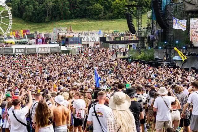 The crowd watching performers on stage.