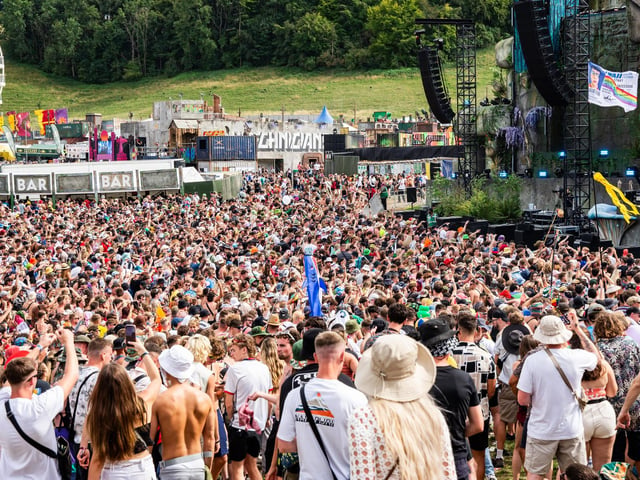 The crowd watching performers on stage.