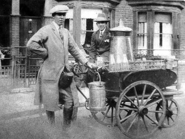 Co-op dairymen at work in Cowper Road, Buckland, PortsmouthThe society first opened its dairy branch in 1913, when there was bitter opposition from private traders leading to fears that the new dairy would be sabotaged. So when the first Co-op milkmen went out on their rounds they were given police protection.This picture shows two dairymen at work in Cowper Road, Buckland, in the day