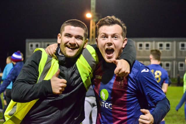 Callum Glenn, right, celebrates with Harry Bedford, after US Portsmouth's FA Vase third round win against Millbrook in December. The Vase is now set to restart in April. Pic: Daniel Haswell.