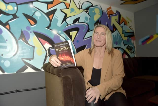 Joanne McGee (49) from Southsea, has written a book on her life.Picture: Sarah Standing (260123-8825)