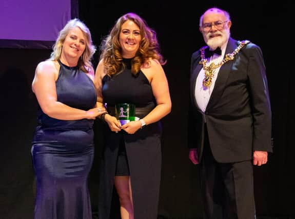 Award Recipient for 'Community :Other' Sam Canaway of Rain To Rainbow with Presenter Alison Lee of Biscoe Solicitors and Lord Mayor of Portsmouth, Councillor Hugh Mason at The Pamodzi Inspirational Women of Portsmouth Awards 2023. 
Picture credit: Emma Terracciano