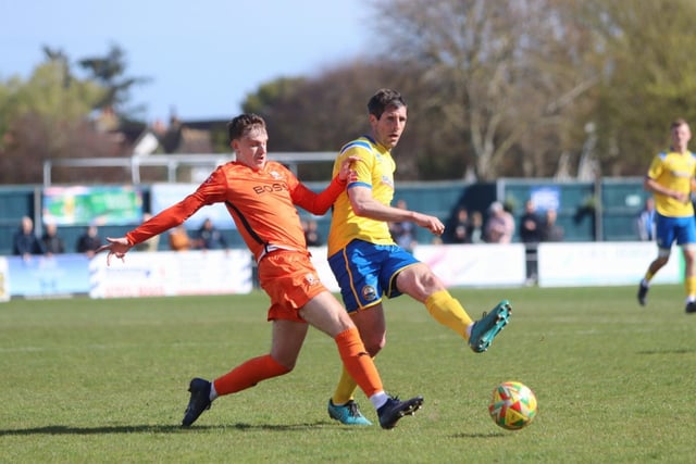 Gosport's Danny Hollands in action against Hartley Wintney. Picture by Tom Phillips