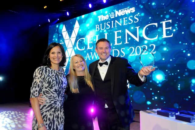 The News Business Excellence Awards 2022. Pictured is: (l-r) awards host Anjana Gadgil, sponsor Jo Sawford, business director at Solent LEP with Overall Business of the Year winner Daryn Brewer from Pro Pods. Picture: Sarah Standing
